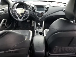 2013 Hyundai Veloster Turbo z VIN KMHTC6AEXDU134283, wystawiony jako Copart lot #39048284 z przebiegiem 97 988 mil mil oraz Szkoda całkowita • Salvage title. Historia ofert i sprzedaży dostępna na DreamBid. Obrazek 8.