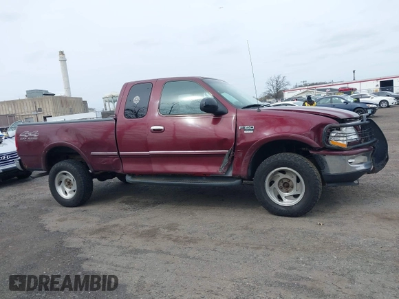1998 Ford F-150 XL with VIN 1FTDX18W9WKA01690, listed as a IAAI auction lot 41944734 with 176,359 mi miles. Bid and sale history available at carsss.com. Image 13.