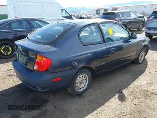 2005 Hyundai Accent GLS with VIN KMHCG35C95U365902, listed as a IAAI auction lot 41715161 with 149,766 mi miles. Bid and sale history available at carsss.com. Image 4.
