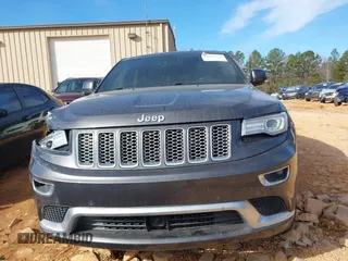 2015 Jeep Grand Cherokee Summit with VIN 1C4RJFJG8FC679185, listed as a IAAI auction lot 41653531 with 158,186 mi miles and . Bid and sale history available at DreamBid. Image 13.