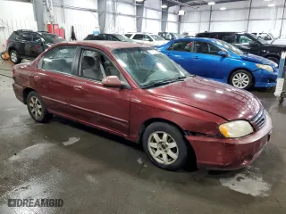 2003 Kia Spectra with VIN KNAFB121735217341, listed as a Copart auction lot 72016504 with 116,224 mi miles and Salvage Title. Bid and sale history available at carsss.com. Image 4.