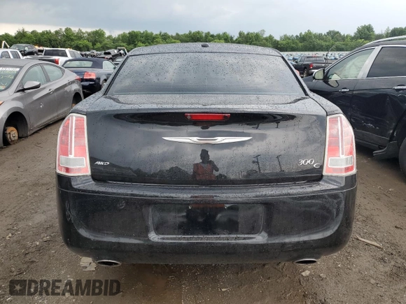 2012 Chrysler 300 C with VIN 2C3CCAKT9CH278272, listed as a Copart auction lot 61398504 with 119,190 mi miles and Salvage Title. Bid and sale history available at DreamBid. Image 6.