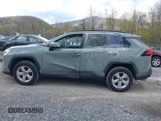 2019 Toyota RAV4 XLE with VIN 2T3P1RFV0KC014516, listed as a IAAI auction lot 41971856 with 94,447 mi miles and . Bid and sale history available at DreamBid. Image 14.