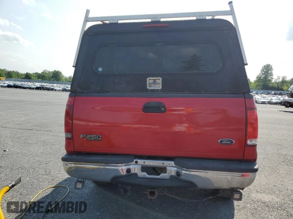 2003 Ford F-250 XL with VIN 1FTNX21L93EA90875, listed as a Copart auction lot 60304115 with 136,956 mi miles and Salvage title. Bid and sale history available at DreamBid. Image 6.