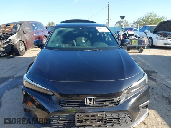 2022 Honda Civic Sport z VIN 2HGFE2F50NH568764, wystawiony jako IAAI lot #41867230 z przebiegiem 102 167 mil mil oraz . Historia ofert i sprzedaży dostępna na DreamBid. Obrazek 12.