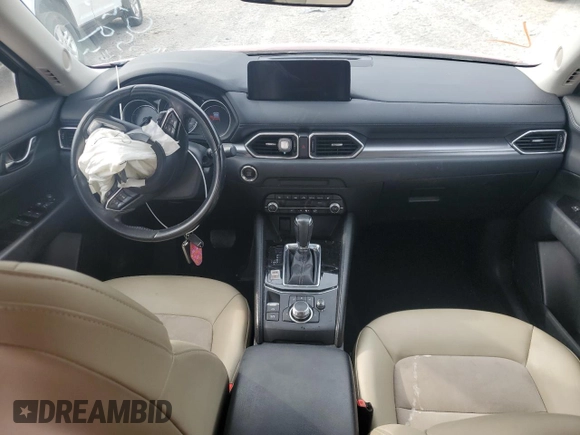2021 Mazda CX-5 Touring with VIN JM3KFACM7M0334633, listed as a Copart auction lot 51618875 with 70,558 mi miles and Salvage Title. Bid and sale history available at DreamBid. Image 8.