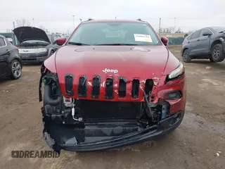 2014 Jeep Cherokee Latitude z VIN 1C4PJMCS4EW127709, wystawiony jako IAAI lot #42002110 z przebiegiem 51 574 mil mil oraz . Historia ofert i sprzedaży dostępna na DreamBid. Obrazek 6.