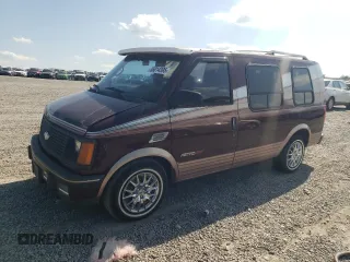 1992 Chevrolet Astro Cargo z VIN 1GBDM19Z6NB146576, wystawiony jako Copart lot #55014395 z przebiegiem 179 481 mil mil oraz Szkoda całkowita • Salvage title. Historia ofert i sprzedaży dostępna na DreamBid. Obrazek 1.