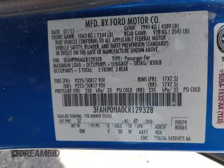 2012 Ford Fusion SE z VIN 3FAHP0HA0CR129328, wystawiony jako IAAI lot #41071631 z przebiegiem 174 913 mil mil oraz . Historia ofert i sprzedaży dostępna na DreamBid. Obrazek 9.
