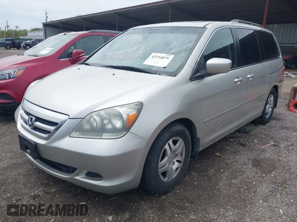 2007 Honda Odyssey EX-L with VIN 5FNRL38767B455948, listed as a IAAI auction lot 42154879 with 232,645 mi miles and . Bid and sale history available at DreamBid. Image 2.