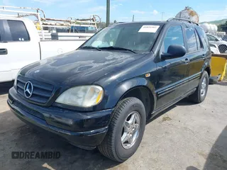 1998 Mercedes-Benz M-Class with VIN 4JGAB54E9WA019694, listed as a IAAI auction lot 41891982 with 282,454 mi miles. Bid and sale history available at carsss.com. Image 2.
