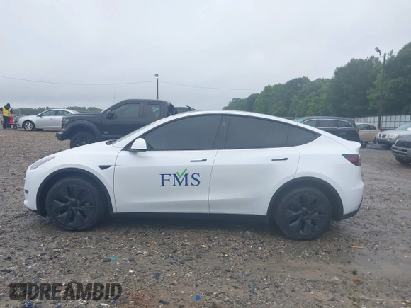 2024 Tesla Model Y with VIN 7SAYGDED9RA331840, listed as a IAAI auction lot 42350926 with 13,818 mi miles and . Bid and sale history available at DreamBid. Image 14.