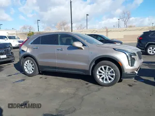 2023 Cadillac XT4 FWD Luxury z VIN 1GYAZAR40PF135132, wystawiony jako IAAI lot #41684609 z przebiegiem 12 164 mil mil oraz . Historia ofert i sprzedaży dostępna na DreamBid. Obrazek 14.