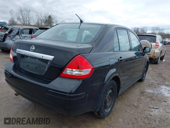 2011 Nissan Versa 1.8 S with VIN 3N1BC1AP7BL378133, listed as a IAAI auction lot 41917425 with 124,228 mi miles. Bid and sale history available at carsss.com. Image 4.