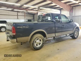 2002 Ford F-150 XL with VIN 1FTRX18L62NA69837, listed as a Copart auction lot 61581935 with 130,078 mi miles and Salvage title. Bid and sale history available at DreamBid. Image 3.