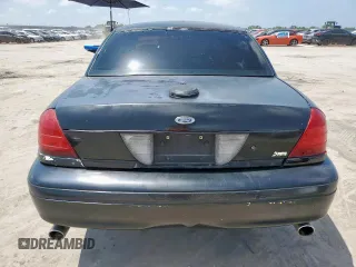 2010 Ford Police Interceptor with VIN 2FABP7BV9AX110091, listed as a Copart auction lot 60065205 with Not provided miles and Salvage title. Bid and sale history available at DreamBid. Image 6.