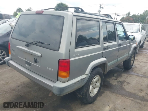 2000 Jeep Cherokee with VIN 1J4FF48S7YL220827, listed as a IAAI auction lot 42871669 with 146,466 mi miles and . Bid and sale history available at DreamBid. Image 4.