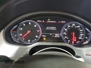 2015 Audi A8 z VIN WAUJGAFDXFN008499, wystawiony jako Copart lot #87658385 z przebiegiem 103 175 mil mil oraz Szkoda całkowita • Salvage title. Historia ofert i sprzedaży dostępna na DreamBid. Obrazek 9.