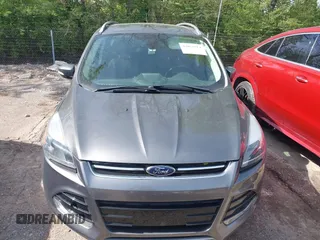 2014 Ford Escape Titanium with VIN 1FMCU9J98EUB66961, listed as a IAAI auction lot 42057914 with 101,943 mi miles. Bid and sale history available at carsss.com. Image 12.