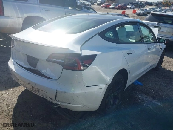 2021 Tesla Model 3 Performance with VIN 5YJ3E1EC6MF020249, listed as a IAAI auction lot 41615863 with 1 mi miles. Bid and sale history available at carsss.com. Image 4.