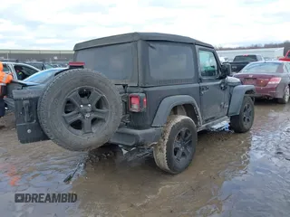 2018 Jeep Wrangler Sport S with VIN 1C4GJXAG4JW168920, listed as a IAAI auction lot 41457619 with 84,053 mi miles and . Bid and sale history available at DreamBid. Image 4.