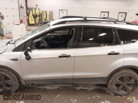 2014 Ford Escape SE z VIN 1FMCU9GX1EUD67624, wystawiony jako IAAI lot #41986362 z przebiegiem 79 921 mil mil oraz . Historia ofert i sprzedaży dostępna na DreamBid. Obrazek 14.