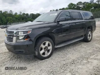 2019 Chevrolet Suburban LT z VIN 1GNSCHKC7KR218433, wystawiony jako Copart lot #60855985 z przebiegiem 97 517 mil mil oraz Czysty tytuł • Clean title. Historia ofert i sprzedaży dostępna na DreamBid. Obrazek 1.