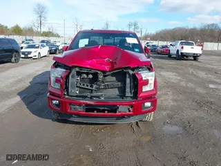 2015 Ford F-150 XLT w/HD Payload Pkg with VIN 1FTFW1EF2FFB76243, listed as a IAAI auction lot 41150866 with 124,478 mi miles. Bid and sale history available at carsss.com. Image 12.