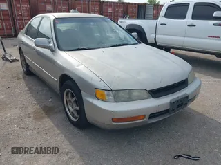 1996 Honda Accord Value with VIN 1HGCD5690TA212711, listed as a IAAI auction lot 42035289 with 184,592 mi miles and . Bid and sale history available at carsss.com. Image 1.