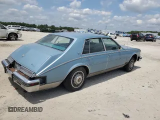 1985 Cadillac Seville z VIN 1G6KS6985FE825187, wystawiony jako Copart lot #54197375 z przebiegiem 2706 mil mil oraz Tytuł czysty. Historia ofert i sprzedaży dostępna na DreamBid. Obrazek 3.