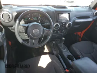 2015 Jeep Wrangler Unlimited Rubicon with VIN 1C4BJWFG7FL719038, listed as a Copart auction lot 51507205 with 62,664 mi miles and Salvage Title. Bid and sale history available at carsss.com. Image 8.