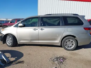 2015 Toyota Sienna XLE with VIN 5TDYK3DC8FS547056, listed as a IAAI auction lot 41387793 with 140,767 mi miles and . Bid and sale history available at DreamBid. Image 15.