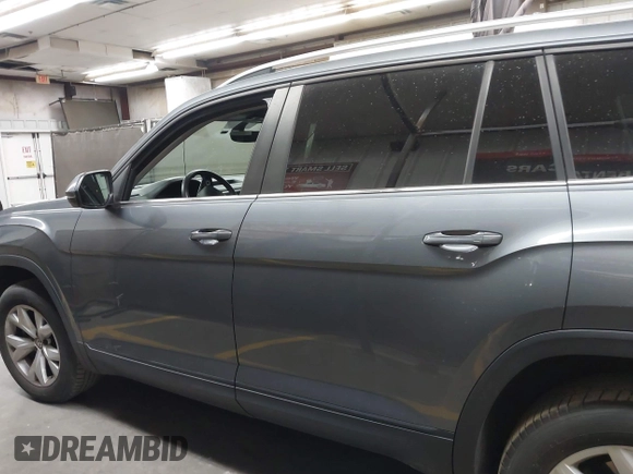 2019 Volkswagen Atlas SE с VIN 1V2DR2CA1KC591124, выставлен на аукционе IAAI как лот 42111572 с пробегом 40 430 миль миль и . История ставок и продаж доступна на DreamBid. Изображение 14.