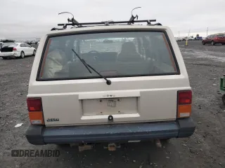 1996 Jeep Cherokee Sport with VIN 1J4FJ68S6TL112962, listed as a Copart auction lot 41540935 with 234,458 mi miles and Salvage Title. Bid and sale history available at carsss.com. Image 6.