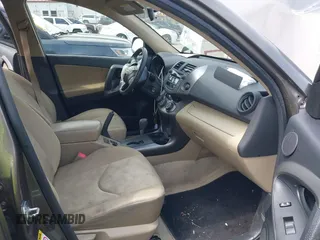 2009 Toyota RAV4 with VIN JTMZF33V69D015171, listed as a IAAI auction lot 42006163 with 122,927 mi miles. Bid and sale history available at carsss.com. Image 5.