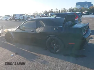 2016 Dodge Challenger R/T Scat Pack z VIN 2C3CDZFJ8GH275714, wystawiony jako IAAI lot #41867179 z przebiegiem Nie podano mil oraz . Historia ofert i sprzedaży dostępna na DreamBid. Obrazek 14.