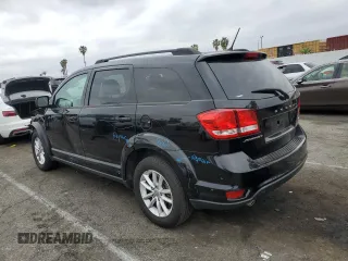 2016 Dodge Journey SXT with VIN 3C4PDCBG8GT127462, listed as a Copart auction lot 49276685 with 128,994 mi miles and Salvage Title. Bid and sale history available at carsss.com. Image 2.