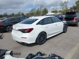 2025 Honda Civic Sport with VIN 2HGFE2F53SH547032, listed as a IAAI auction lot 41894215 with 6,438 mi miles and . Bid and sale history available at DreamBid. Image 4.