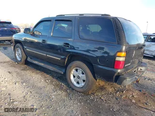 2005 Chevrolet Tahoe LS with VIN 1GNEK13T75J126912, listed as a IAAI auction lot 41370116 with 242,937 mi miles. Bid and sale history available at carsss.com. Image 3.