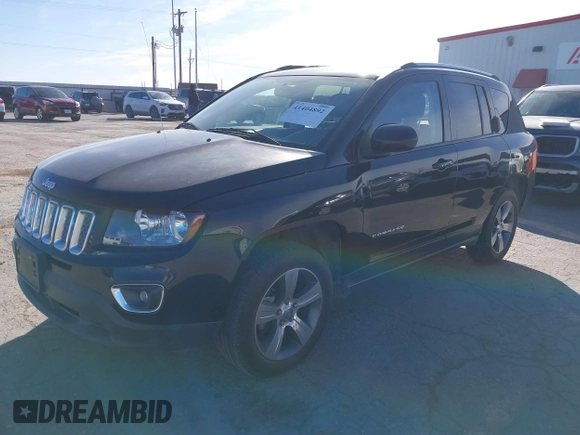 2016 Jeep Compass High Altitude Edition with VIN 1C4NJCEA2GD761735, listed as a IAAI auction lot 41404892 with 114,129 mi miles. Bid and sale history available at carsss.com. Image 2.