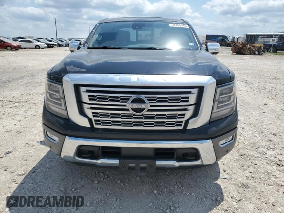 2023 Nissan Titan Platinum Reserve with VIN 1N6AA1EDXPN106467, listed as a Copart auction lot 53455215 with 56,061 mi miles and Salvage title. Bid and sale history available at DreamBid. Image 5.