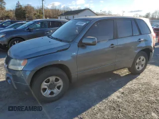 2006 Suzuki Grand Vitara z VIN JS3TE941664103061, wystawiony jako Copart lot #83084904 z przebiegiem 207 213 mil mil oraz Szkody całkowita. Historia ofert i sprzedaży dostępna na DreamBid. Obrazek 1.
