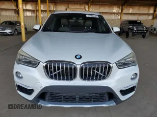 2016 BMW X1 xDrive28i z VIN WBXHT3C35GP881610, wystawiony jako Copart lot #57690625 z przebiegiem 189 579 mil mil oraz Czysty tytuł • Clean title. Historia ofert i sprzedaży dostępna na DreamBid. Obrazek 5.