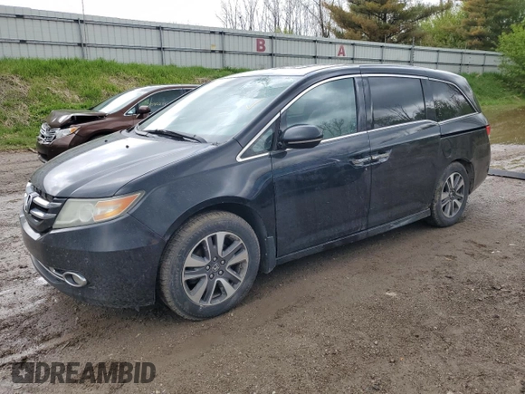 2014 Honda Odyssey Touring z VIN 5FNRL5H97EB508649, wystawiony jako Copart lot #55665245 z przebiegiem 162 892 mil mil oraz Czysty tytuł • Clean title. Historia ofert i sprzedaży dostępna na DreamBid. Obrazek 1.