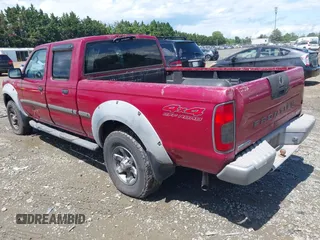 2002 Nissan Frontier XE z VIN 1N6ED29Y82C310880, wystawiony jako IAAI lot #42341208 z przebiegiem 280 511 mil mil oraz . Historia ofert i sprzedaży dostępna na DreamBid. Obrazek 3.