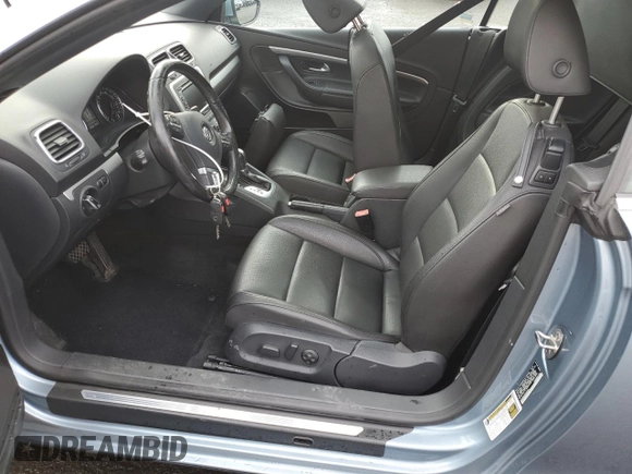 2013 Volkswagen Eos Komfort with VIN WVWBW8AH9DV007077, listed as a Copart auction lot 80254434 with 87,620 mi miles and Salvage Title. Bid and sale history available at DreamBid. Image 7.