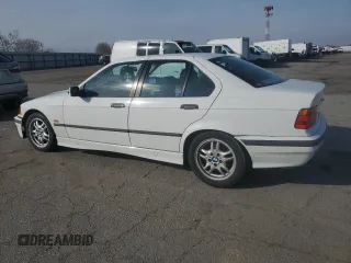 1998 BMW 3 Series 328iA with VIN WBACD4324WAV61646, listed as a Copart auction lot 43607845 with 253,609 mi miles and Salvage Title. Bid and sale history available at carsss.com. Image 2.