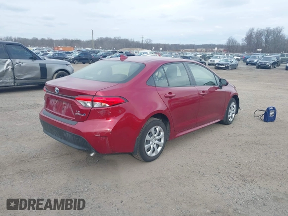 2023 Toyota Corolla Hybrid LE with VIN JTDBCMFE2PJ003738, listed as a IAAI auction lot 41620152 with 4,926 mi miles. Bid and sale history available at carsss.com. Image 4.