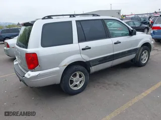 2005 Honda Pilot LX with VIN 2HKYF18105H556470, listed as a IAAI auction lot 42094372 with 266,089 mi miles. Bid and sale history available at carsss.com. Image 4.