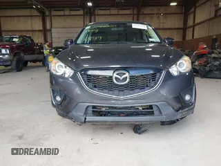 2015 Mazda CX-5 Touring with VIN JM3KE4CY6F0510002, listed as a IAAI auction lot 42045284 with 88,949 mi miles and . Bid and sale history available at DreamBid. Image 6.